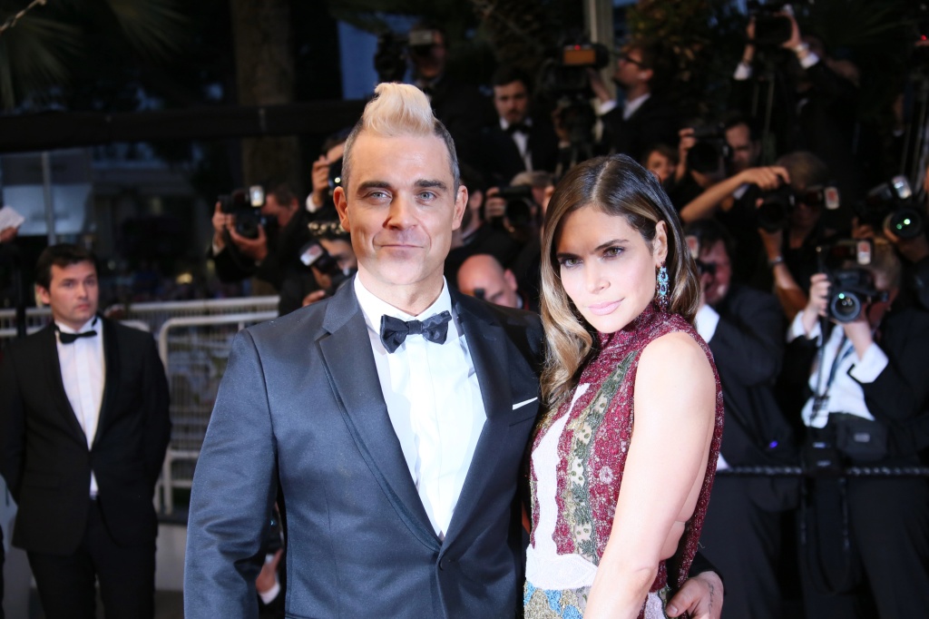 Robbie Williams a Ayda Fieldová - Foto: Depositphotos